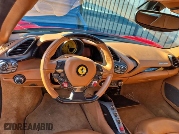 2016 Ferrari 488 z VIN ZFF79ALA5G0214993, wystawiony jako Copart lot #58869925 z przebiegiem 25 520 mil mil oraz Tytuł czysty. Historia ofert i sprzedaży dostępna na DreamBid. Obrazek 9.