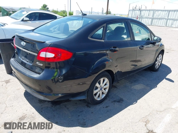 2011 Ford Fiesta SE z VIN 3FADP4BJ6BM121924, wystawiony jako IAAI lot #42453787 z przebiegiem 153 691 mil mil oraz . Historia ofert i sprzedaży dostępna na DreamBid. Obrazek 4.