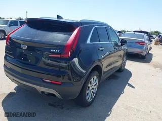 2019 Cadillac XT4 FWD Premium Luxury with VIN 1GYFZCR48KF141478, listed as a IAAI auction lot 41988092 with 53,970 mi miles. Bid and sale history available at carsss.com. Image 4.
