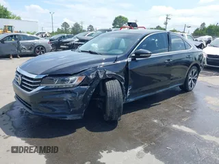 2021 Volkswagen Passat SE z VIN 1VWSA7A39MC002421, wystawiony jako IAAI lot #42097326 z przebiegiem 99 693 mil mil oraz . Historia ofert i sprzedaży dostępna na DreamBid. Obrazek 2.