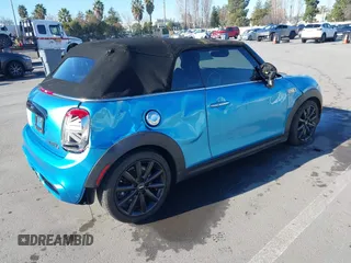 2019 MINI Convertible Cooper S with VIN WMWWG9C50K3J31011, listed as a IAAI auction lot 41332186 with 82,105 mi miles. Bid and sale history available at carsss.com. Image 4.