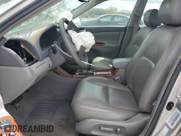 2003 Toyota Camry LE with VIN 4T1BE32K43U185592, listed as a Copart auction lot 51314275 with 284,330 mi miles and Salvage Title. Bid and sale history available at DreamBid. Image 7.