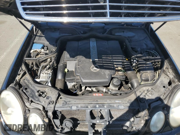 2006 Mercedes-Benz E 500 z VIN WDBUF70J76A888197, wystawiony jako Copart lot #58199365 z przebiegiem 174 100 mil mil oraz Czysty tytuł • Clean title. Historia ofert i sprzedaży dostępna na DreamBid. Obrazek 11.