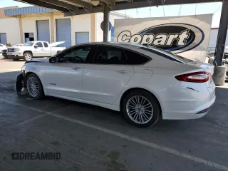 2013 Ford Fusion SE Hybrid with VIN 3FA6P0LU1DR192576, listed as a Copart auction lot 58025775 with 152,155 mi miles and Salvage title. Bid and sale history available at DreamBid. Image 2.