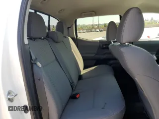 2023 Toyota Tacoma SR z VIN 3TMCZ5AN5PM594103, wystawiony jako Copart lot #52957955 z przebiegiem 21 759 mil mil oraz Szkoda całkowita • Salvage title. Historia ofert i sprzedaży dostępna na DreamBid. Obrazek 10.