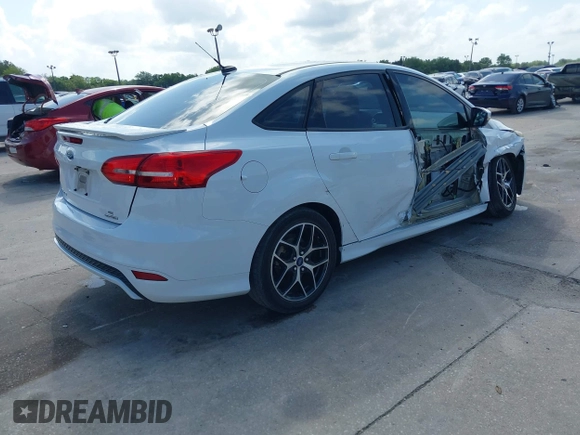 2016 Ford Focus SE with VIN 1FADP3F2XGL356462, listed as a IAAI auction lot 41941656 with 85,904 mi miles. Bid and sale history available at carsss.com. Image 4.