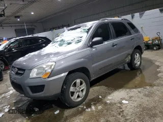 2009 Kia Sportage LX with VIN KNDJE723797593947, listed as a Copart auction lot 45028715 with 86,876 mi miles and Salvage Title. Bid and sale history available at carsss.com. Image 1.