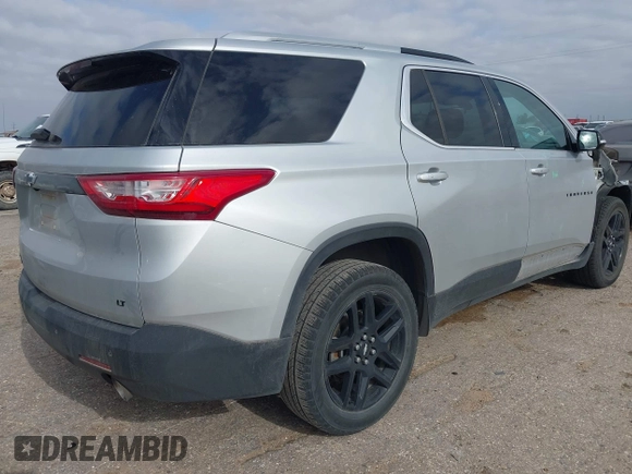 2018 Chevrolet Traverse LT Cloth z VIN 1GNEVGKW5JJ261287, wystawiony jako IAAI lot #42068315 z przebiegiem 152 956 mil mil oraz . Historia ofert i sprzedaży dostępna na DreamBid. Obrazek 4.