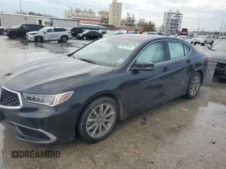 2019 Acura TLX with VIN 19UUB1F31KA002597, listed as a Copart auction lot 86573334 with 86,033 mi miles and Salvage Title. Bid and sale history available at carsss.com. Image 1.