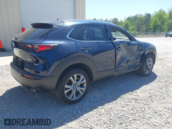 2024 Mazda CX-30 2.5 S Premium Package with VIN 3MVDMBDM7RM654243, listed as a IAAI auction lot 42044783 with 27,936 mi miles. Bid and sale history available at carsss.com. Image 4.