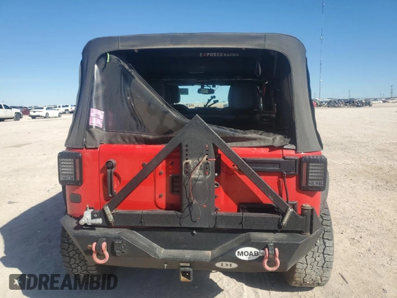 2016 Jeep Wrangler Unlimited Rubicon with VIN 1C4BJWFGXGL183011, listed as a Copart auction lot 42310535 with 165,227 mi miles and Salvage title. Bid and sale history available at DreamBid. Image 6.