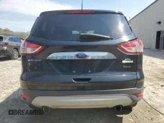 2013 Ford Escape SEL with VIN 1FMCU0HX4DUC48961, listed as a Copart auction lot 52630795 with 179,786 mi miles and Salvage Title. Bid and sale history available at DreamBid. Image 6.