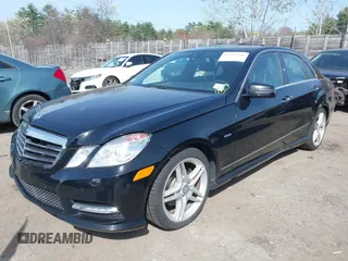 2012 Mercedes-Benz E E 350 Luxury with VIN WDDHF8JB1CA613068, listed as a IAAI auction lot 42119706 with 197,476 mi miles. Bid and sale history available at carsss.com. Image 17.