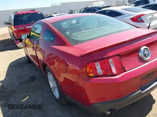 2012 Ford Mustang V6 Premium with VIN 1ZVBP8AM4C5269594, listed as a IAAI auction lot 41749935 with 195,719 mi miles. Bid and sale history available at carsss.com. Image 3.