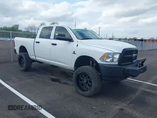 2017 Ram 2500 Tradesman with VIN 3C6UR5CL7HG780846, listed as a IAAI auction lot 41868052 with 103,809 mi miles and . Bid and sale history available at DreamBid. Image 1.