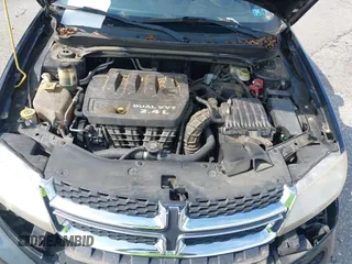 2013 Dodge Avenger SXT with VIN 1C3CDZCB7DN650959, listed as a IAAI auction lot 42592881 with 107,652 mi miles and . Bid and sale history available at DreamBid. Image 10.