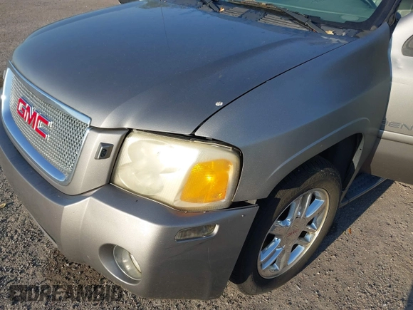 2008 GMC Envoy Denali with VIN 1GKES63M982258281, listed as a IAAI auction lot 42022548 with 265,129 mi miles. Bid and sale history available at carsss.com. Image 6.