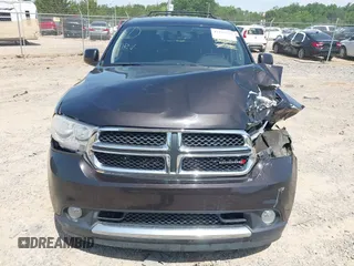 2013 Dodge Durango SXT with VIN 1C4RDJAG7DC580249, listed as a IAAI auction lot 42535723 with 199,626 mi miles and . Bid and sale history available at DreamBid. Image 12.