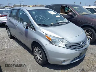 2016 Nissan Note S z VIN 3N1CE2CP5GL401496, wystawiony jako IAAI lot #42100925 z przebiegiem 127 574 mil mil oraz . Historia ofert i sprzedaży dostępna na DreamBid. Obrazek 1.