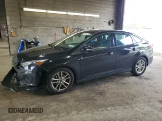 2016 Ford Focus SE z VIN 1FADP3F29GL384978, wystawiony jako Copart lot #58511375 z przebiegiem 101 868 mil mil oraz Szkoda całkowita • Salvage title. Historia ofert i sprzedaży dostępna na DreamBid. Obrazek 1.