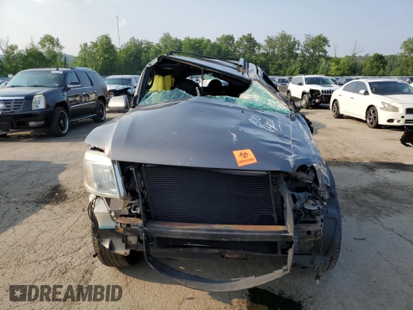 2009 Mercury Mariner Premier with VIN 4M2CU97G39KJ16748, listed as a Copart auction lot 60787005 with 191,206 mi miles and Salvage title. Bid and sale history available at DreamBid. Image 5.
