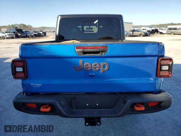 2023 Jeep Gladiator Mojave with VIN 1C6JJTEG7PL580727, listed as a Copart auction lot 48030215 with 12,707 mi miles and Salvage title. Bid and sale history available at DreamBid. Image 6.