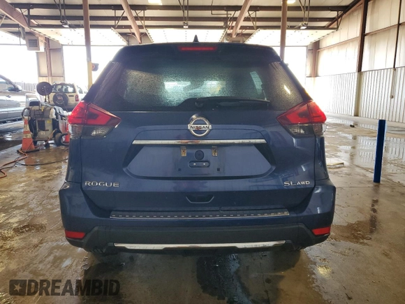 2017 Nissan Rogue SV with VIN 5N1AT2MV7HC858990, listed as a Copart auction lot 55494495 with 108,589 mi miles and Salvage title. Bid and sale history available at DreamBid. Image 6.