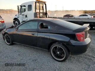 2004 Toyota Celica GT with VIN JTDDR32T040168744, listed as a Copart auction lot 85504754 with 210,919 mi miles and Clean Title. Bid and sale history available at DreamBid. Image 2.