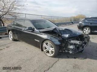2015 BMW 7 Series 750Li with VIN WBAYE8C59FD781898, listed as a Copart auction lot 48712885 with 0 mi miles and Salvage Title. Bid and sale history available at carsss.com. Image 4.