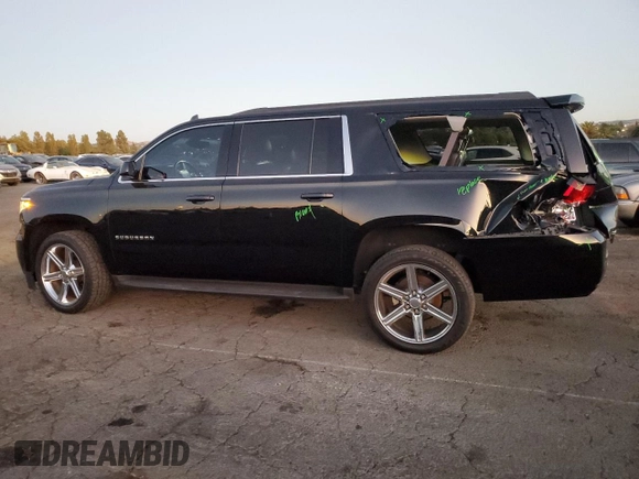 2020 Chevrolet Suburban LS with VIN 1GNSCGKC9LR104008, listed as a Copart auction lot 73351014 with 63,474 mi miles and Salvage title. Bid and sale history available at DreamBid. Image 2.