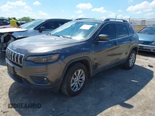 2021 Jeep Cherokee Latitude Lux with VIN 1C4PJMMX0MD235006, listed as a IAAI auction lot 42230915 with 76,264 mi miles and . Bid and sale history available at DreamBid. Image 2.