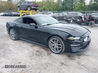 2019 Ford Mustang EcoBoost z VIN 1FA6P8TH8K5129816, wystawiony jako IAAI lot #42261297 z przebiegiem 125 601 mil mil oraz . Historia ofert i sprzedaży dostępna na DreamBid. Obrazek 1.