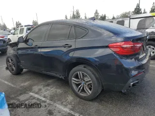2016 BMW X6 sDrive35i with VIN 5UXKU0C54G0F93393, listed as a Copart auction lot 39393874 with 103,254 mi miles. Bid and sale history available at carsss.com. Image 2.