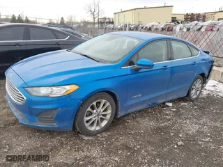 2019 Ford Fusion Hybrid SE with VIN 3FA6P0LUXKR131563, listed as a IAAI auction lot 41448736 with 165,440 mi miles. Bid and sale history available at carsss.com. Image 2.