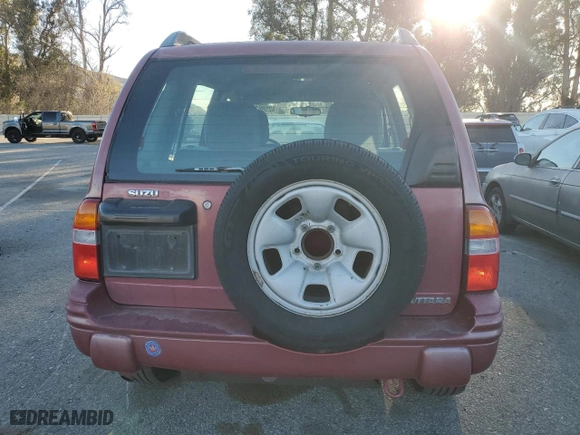 1999 Suzuki Vitara JX with VIN 2S3TD52V6X6101702, listed as a Copart auction lot 42596125 with NaN miles and Clean Title. Bid and sale history available at carsss.com. Image 6.