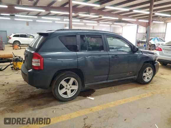 2007 Jeep Compass Sport with VIN 1J8FF47W87D130159, listed as a Copart auction lot 47032565 with 161,236 mi miles and Salvage Title. Bid and sale history available at carsss.com. Image 3.