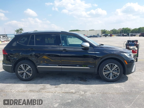 2024 Volkswagen Tiguan with VIN 3VVTB7AX6RM218502, listed as a IAAI auction lot 42063327 with 7,280 mi miles and . Bid and sale history available at DreamBid. Image 14.
