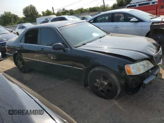 2002 Acura RL with VIN JH4KA96512C013028, listed as a Copart auction lot 71436914 with 142,527 mi miles and Salvage Title. Bid and sale history available at carsss.com. Image 4.