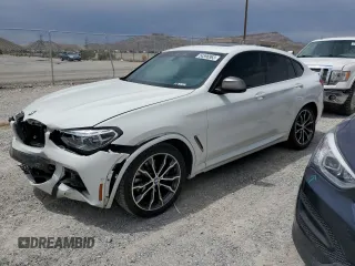 2019 BMW X4 M40i with VIN 5UXUJ5C53KLJ63373, listed as a Copart auction lot 54596963 with 39,245 mi miles. Bid and sale history available at carsss.com. Image 1.