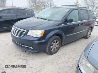 2013 Chrysler Town & Country Touring with VIN 2C4RC1BG4DR595154, listed as a IAAI auction lot 42077785 with 169,474 mi miles. Bid and sale history available at carsss.com. Image 2.