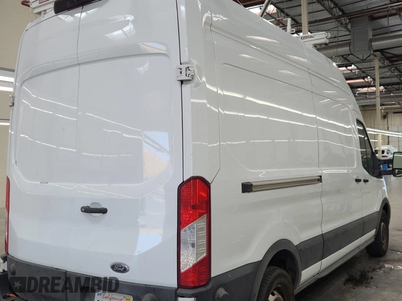 2020 Ford Transit Cargo z VIN 1FTBR1XG3LKB79165, wystawiony jako IAAI lot #42763042 z przebiegiem 140 992 mil mil oraz . Historia ofert i sprzedaży dostępna na DreamBid. Obrazek 43.