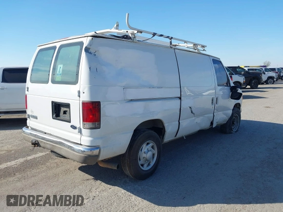 2006 Ford Econoline Cargo with VIN 1FTSE34L66HB03093, listed as a IAAI auction lot 41197550 with 310,863 mi miles. Bid and sale history available at carsss.com. Image 4.