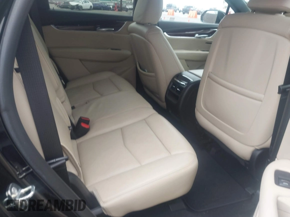 2019 Cadillac XT5 Premium Luxury FWD z VIN 1GYKNERS3KZ134635, wystawiony jako IAAI lot #41889843 z przebiegiem 56 044 mil mil oraz . Historia ofert i sprzedaży dostępna na DreamBid. Obrazek 8.