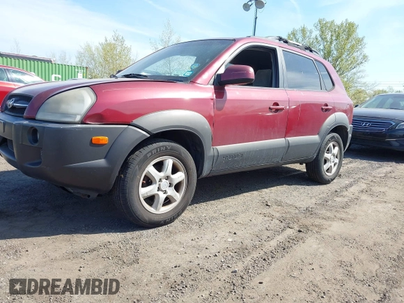 2005 Hyundai Tucson GLS with VIN KM8JN12D35U180615, listed as a IAAI auction lot 42104729 with 128,123 mi miles. Bid and sale history available at carsss.com. Image 2.
