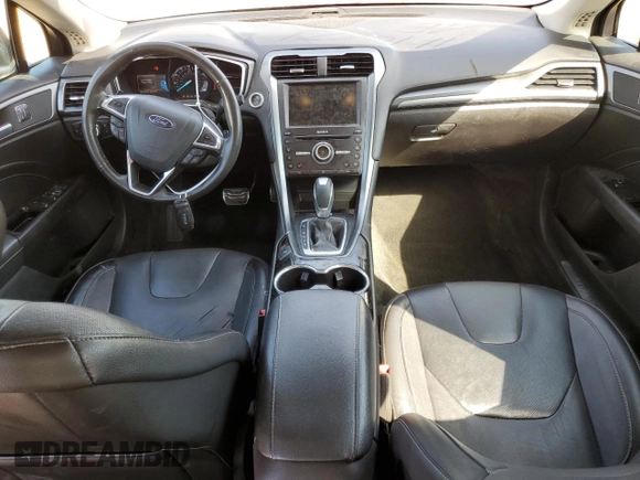 2016 Ford Fusion Titanium z VIN 3FA6P0K98GR151640, wystawiony jako Copart lot #73254594 z przebiegiem 145 473 mil mil oraz Szkoda całkowita • Salvage title. Historia ofert i sprzedaży dostępna na DreamBid. Obrazek 8.