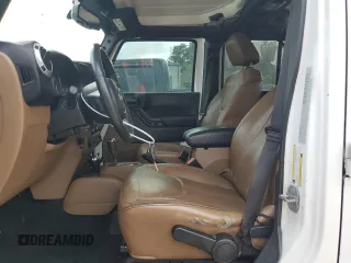 2015 Jeep Wrangler Unlimited Sahara with VIN 1C4HJWEG7FL671259, listed as a Copart auction lot 60151225 with 81,281 mi miles and Clean title. Bid and sale history available at DreamBid. Image 7.