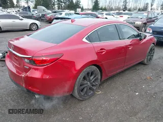 2015 Mazda 6 i Touring with VIN JM1GJ1V5XF1202210, listed as a IAAI auction lot 41231772 with 49,929 mi miles and . Bid and sale history available at DreamBid. Image 4.