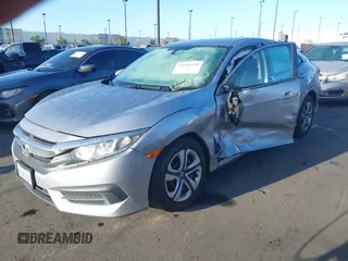 2018 Honda Civic LX with VIN 2HGFC2F58JH571072, listed as a IAAI auction lot 41684450 with 66,032 mi miles and . Bid and sale history available at carsss.com. Image 17.