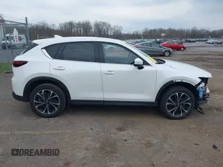 2022 Mazda CX-5 2.5 S Premium Plus Package with VIN JM3KFBEM2N0616960, listed as a IAAI auction lot 42127024 with 30,565 mi miles. Bid and sale history available at carsss.com. Image 14.
