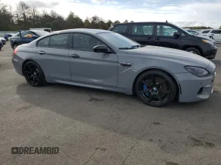 2015 BMW M6 z VIN WBS6C9C58FD467819, wystawiony jako Copart lot #70903944 z przebiegiem 85 596 mil mil oraz Szkoda całkowita • Salvage title. Historia ofert i sprzedaży dostępna na DreamBid. Obrazek 4.
